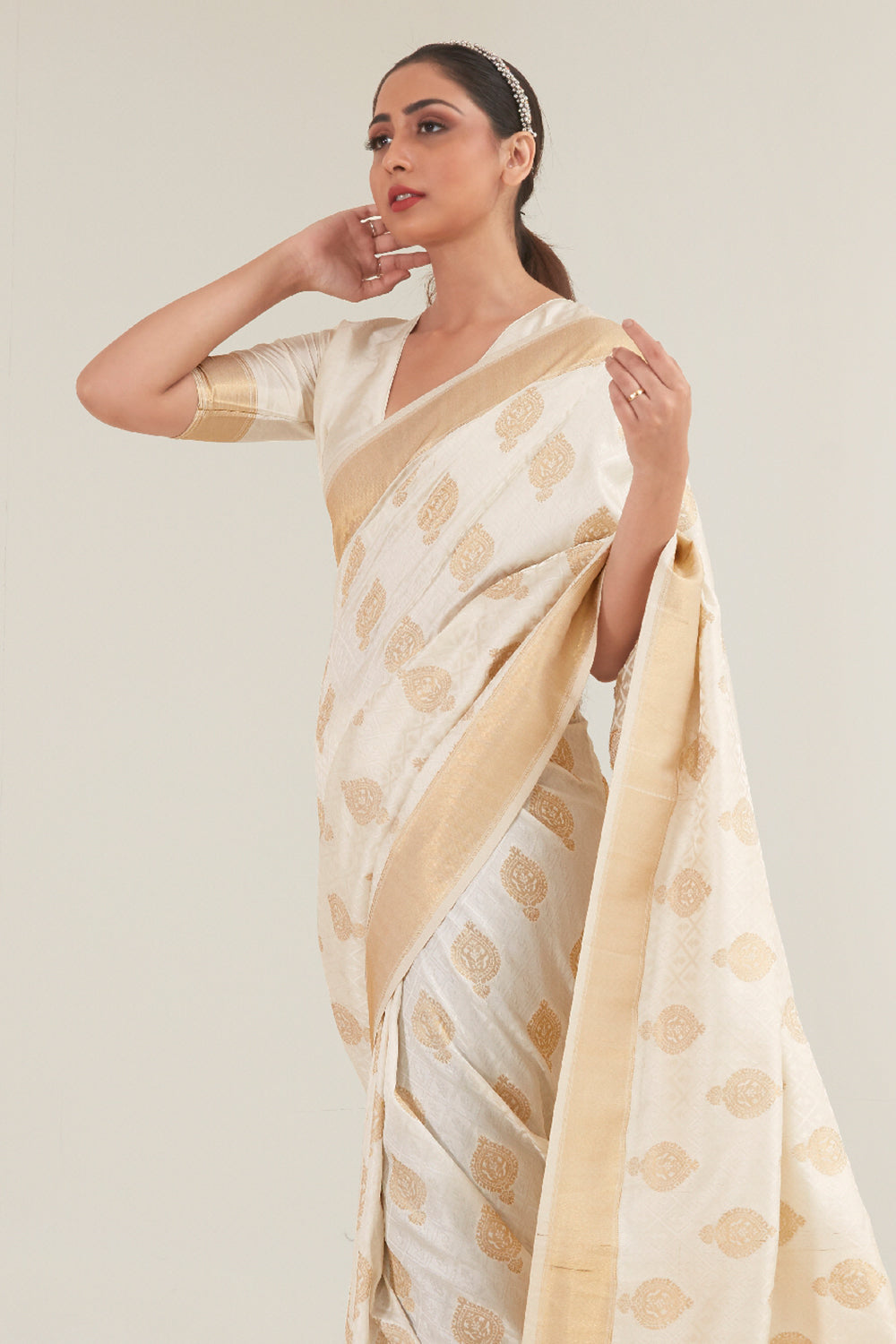 ivory white golden zari butta woven banarasi saree 1